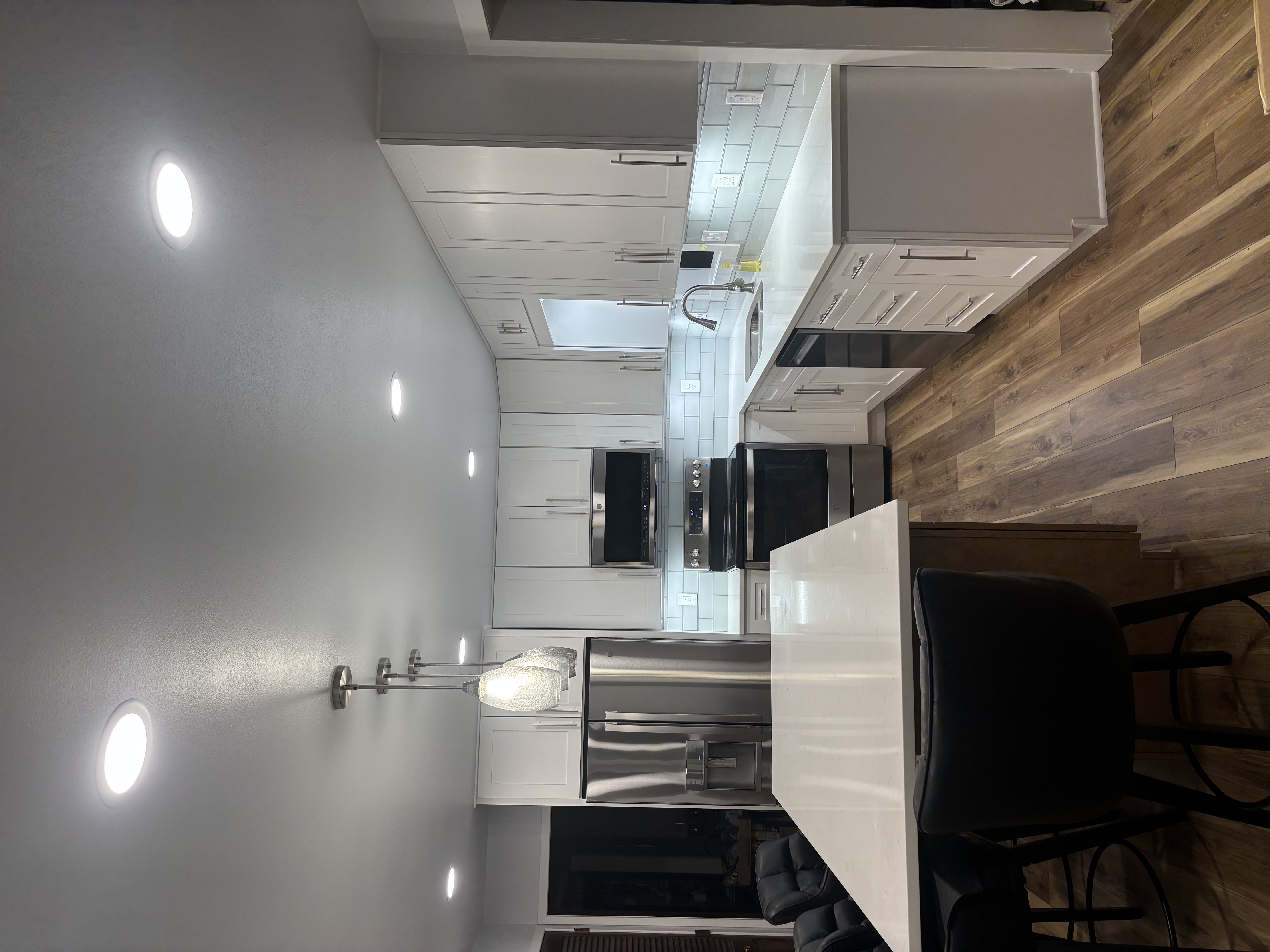 Modern kitchen with recessed lighting installed by Trochez Electric